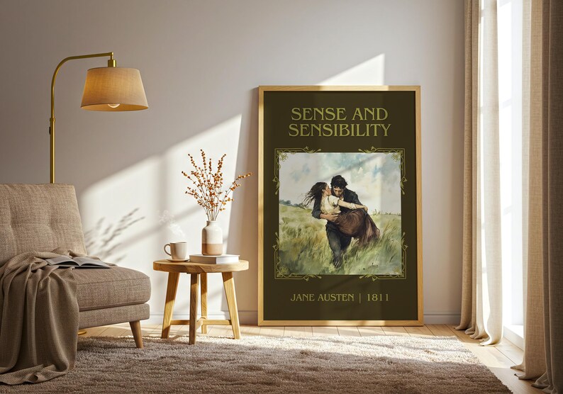 May include: A framed print of "Sense and Sensibility" by Jane Austen. The artwork features a couple embracing in a field, with the title and author's name in gold lettering. The frame is a light wood color, and the print is displayed in a well-lit room.
