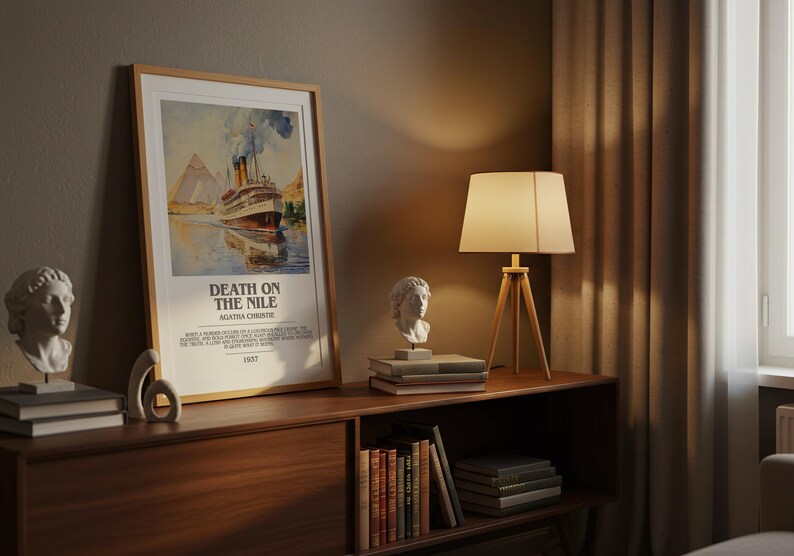 May include: A wooden cabinet with a framed poster of "DEATH ON THE NILE" and a watercolor painting of a boat. A lamp, books, and sculptures are also on the cabinet. The scene is illuminated by warm lighting.