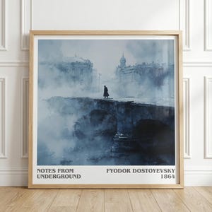 May include: Framed art print featuring a watercolor painting of a person on a bridge in a misty cityscape. The artwork is in shades of blue and gray, with the text "NOTES FROM UNDERGROUND" and "FYODOR DOSTOYEVSKY 1864" at the bottom.