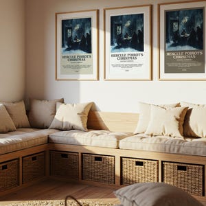 May include: A cozy reading nook with a built-in wooden bench, beige cushions, and woven storage baskets. Three framed movie posters with the text "Hercule Poirot's Christmas" hang above the bench, creating a warm and inviting space.