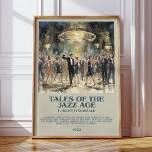 May include: Framed art print of a watercolor painting depicting a jazz age party scene. The artwork features a crowd of people dancing under a large chandelier. The print includes the title "TALES OF THE JAZZ AGE" by F. Scott Fitzgerald and the year 1922.