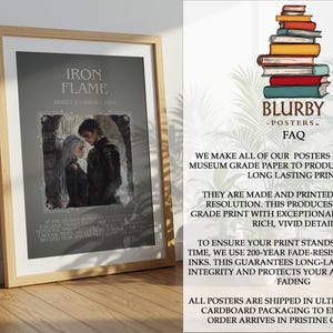 May include: Framed poster titled "Iron Flame" featuring a couple in a romantic embrace. The artwork is set against a gray background with text. The poster is displayed on a wooden floor.