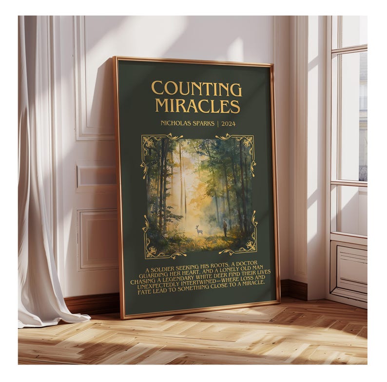 May include: A framed poster with the title "COUNTING MIRACLES" by Nicholas Sparks. The poster features a forest scene with a deer and text describing the story. The frame is gold, and the background is a dark green.