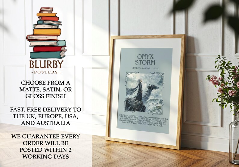 May include: A framed poster with the title "Onyx Storm" and an illustration of a figure and a dragon. The poster is in a light-colored frame and is displayed on a wooden floor. The poster is from Blurbyposters.