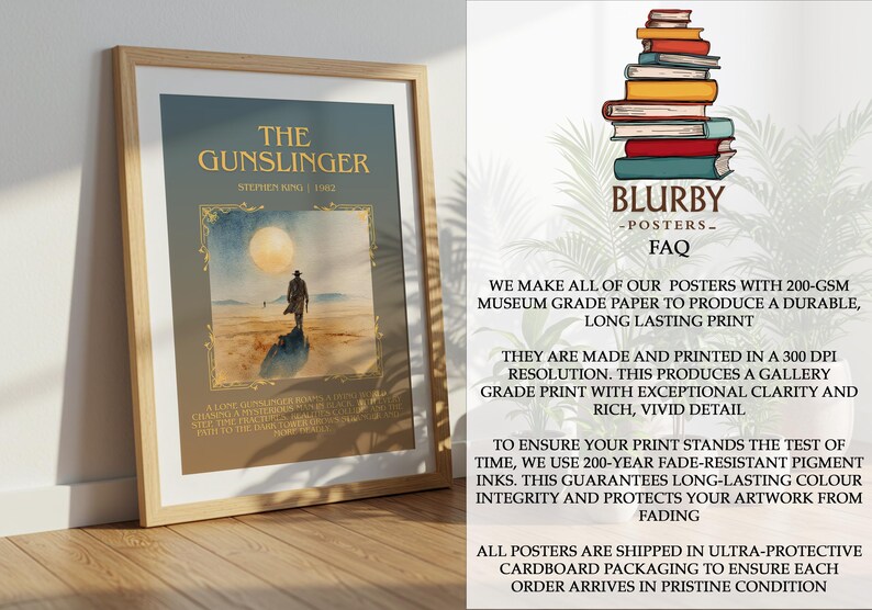 May include: Framed poster of "The Gunslinger" by Stephen King. The artwork shows a lone figure walking towards a large moon in a desert landscape. The poster is in a wooden frame.
