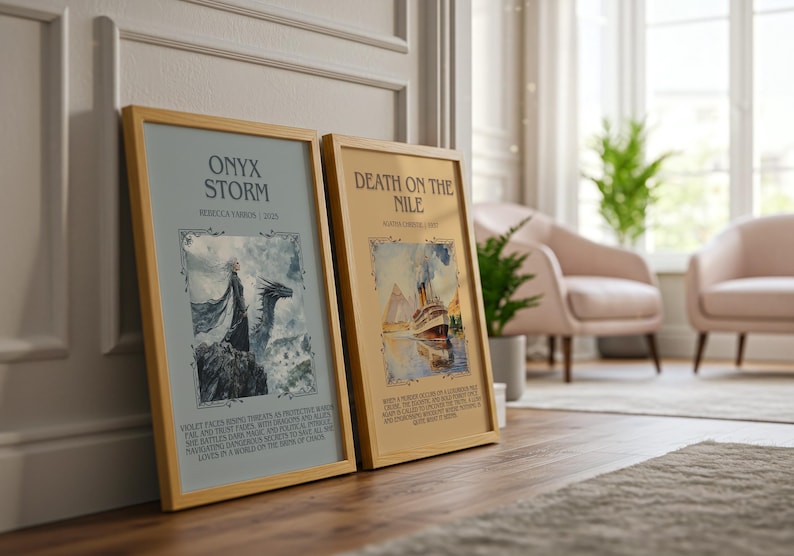 May include: Two framed art prints with wooden frames. The left print is titled "ONYX STORM" with a dragon illustration. The right print is titled "DEATH ON THE NILE" with a ship illustration. Both prints have decorative borders.