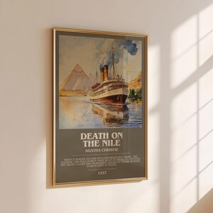 May include: A framed poster with a vintage illustration of a ship on a river, with pyramids in the background. The poster is titled "Death on the Nile" by Agatha Christie, with the year 1937 displayed below the title.