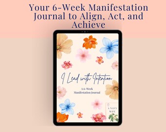May include: A digital tablet displays a 6-Week Manifestation Journal with floral illustrations. The journal cover features the text "I Lead with Intention" and "A 6-Week Manifestation Journal". The tablet is surrounded by a soft peach background.