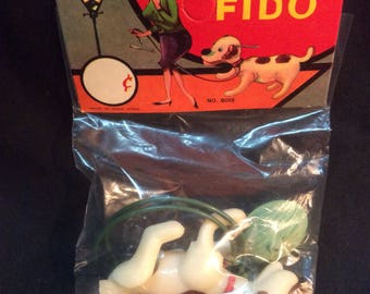 squeeze bulb jumping frog toy