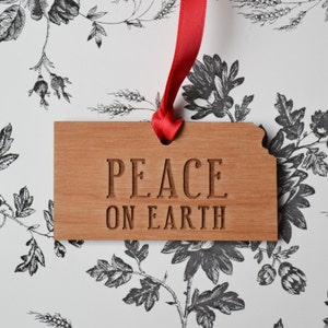 PEACE ON EARTH Engraved Kansas Ornament