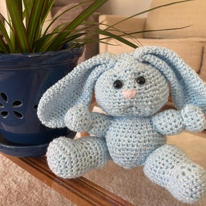 Cute stuffed blue bunny plush
