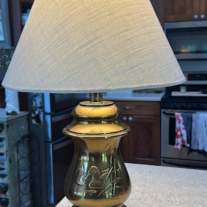 vintage brass lamp with ducks