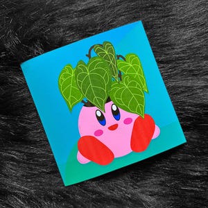 May include: A pink cartoon character with big eyes and a smile, sitting in a pot with a green leafy plant. The character is wearing red shoes and has a green background.
