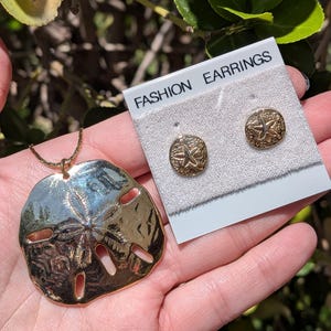 Gold Toned Sand Dollar Necklace and Earrings Set
