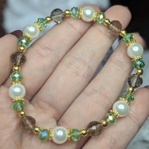 Bracelet en perles de verre vert à facettes et en perles