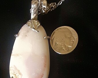 Sterling silver and Spencer Idaho opal pendant, with  leaf and heavy decorative bail