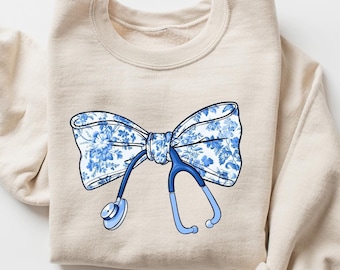 Nurse Toile Bow Sweatshirt, Stethoscope Bow Shirt, Healthcare Professionals Shirt, Nurse Coquette Shirt, Nurse Appreciation, Gift for Nurse