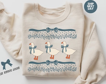 Sudadera fea de ganso con corazones y lazo azul de los años 80. Sudadera vintage original con lazos y adorables corazones de garabatos. Camiseta de ganso para amantes de los animales.