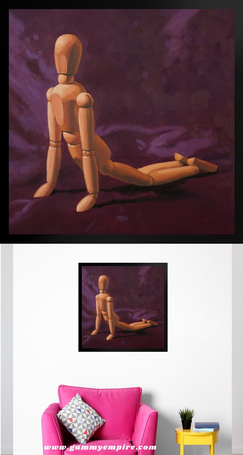 May include: A wooden artist's mannequin posed in a kneeling position on a purple background. The mannequin is made of wood and has a natural finish.