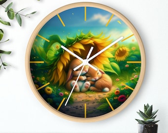 May include: A round wooden wall clock with a white face and black hands. The clock face features a colorful illustration of two bunnies sleeping under a sunflower. The background is a green field with yellow flowers.