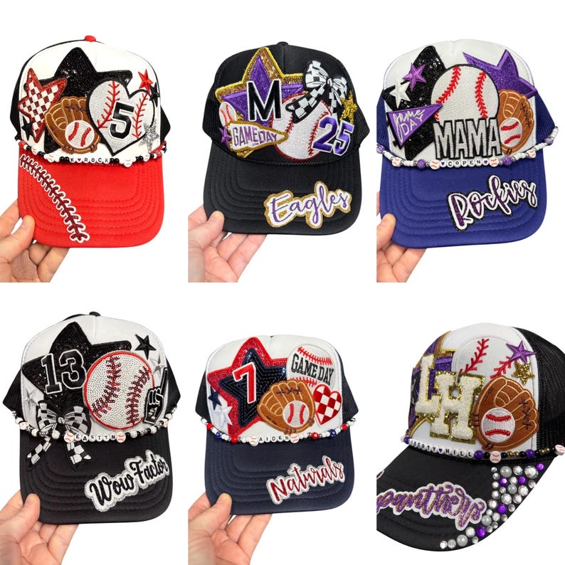 May include: A selection of baseball caps with baseball-themed designs. Each cap features a baseball, star, and team name. Colours include red, black, white, and blue. Some caps have the text "Game Day", "Mama", "Eagles", "Rockies", "Wow Factor", and "Naturals".