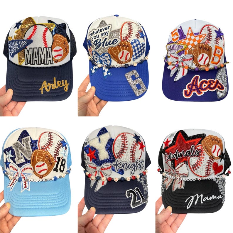 May include: Six baseball caps with baseball-themed designs. Each cap features baseballs, gloves, and decorative elements. Some caps have text like "MAMA," "Arley," "Aces," and "Cardinals." The caps are in various colours, including blue, white, red, and black.