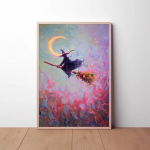 May include: A framed painting depicts a witch on a broomstick flying past a crescent moon. The witch is wearing a black hat and cloak. The artwork features a colorful, textured background with pink and purple hues.