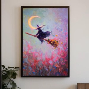 May include: A framed painting depicts a witch on a broomstick flying past a crescent moon. The witch is wearing a black hat and cloak. The broom is decorated with flowers. The background is a mix of pink, purple, and blue.