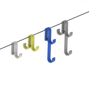 May include: A collection of colorful metal hooks hanging from a thin, dark wire. The hooks are in shades of gray, yellow, and blue. The hooks are designed with a double-hooked bottom.
