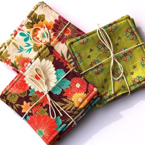 three floral sets of coasters