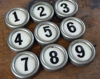 Vintage cash register keys, numbered one through 10