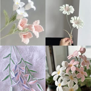May include: A collection of crocheted flowers in various colors, including white, pink, and green. The flowers are arranged in bouquets and feature different styles, such as bell-shaped and daisy-like.