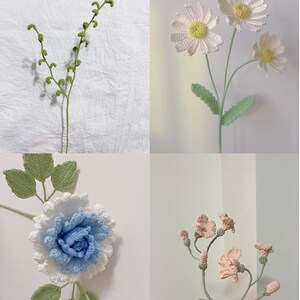 May include: Four crocheted flower stems with green leaves and white, blue, and pink flowers. The flowers are all different types and sizes.