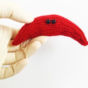 Knit your own Sickle Red Blood Cell (pdf knitting pattern)