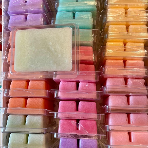 Sugar scrub cubes in exciting seasonal and  fruity fragrances, with coconut/ sweet almond oil to moisturize freshly exfoliated skin