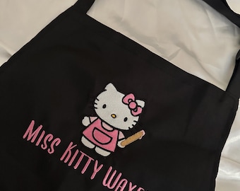 Miss Kitty Waxer with Stick Black Waterproof Apron