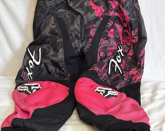 Pantalones de motocross Fox Racing, color rosa y negro, talla 6 para niña, usados como nuevos.
