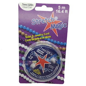 May include: A roll of clear stretch magic bead and jewellery cord. The cord is 5 metres (16.4 feet) long and has a diameter of 0.7 mm (0.028 inches). The packaging is purple and features a red star with the words "Stretch Magic" in white.