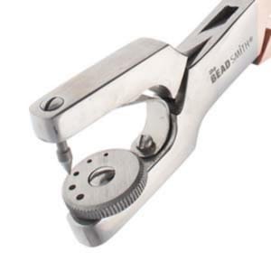 Rotating Leather Punch, by The Beadsmith, # LPUNCH5. Punches .8, 1, 1.2, 1.5, 2mm holes. Great for leather, faux leather, & other textiles.