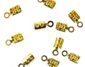 2mm gold plated fold over crimp cord ends, 36 pcs. 2.7mm wide, 4mm fold over flaps, 8.6mm overall length. End for necklaces, bracelets, cord
