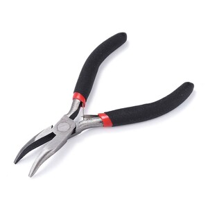 May include: Black and red handled pliers with a silver metal head. The pliers have a rounded tip and are designed for delicate tasks.