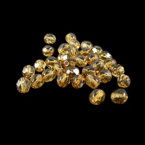 Glass beads: 6 mm faceted round, tortoise gold, Czech fire polished glass, 8&quot; strand, ~32 beads