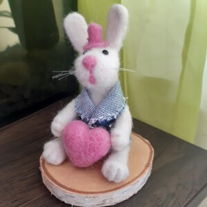 A loving bunny named Fluffy with a heart, wool, handmade.