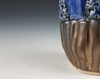 Small carved wine cup, hand built, blue and bronze