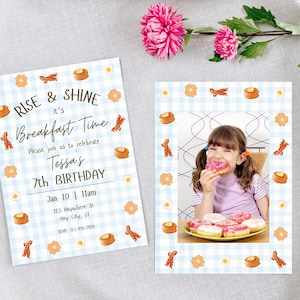 May include: Two breakfast-themed birthday invitations. One features text "Rise & Shine, it's Breakfast Time" and details for a 7th birthday. The other has a photo of a girl eating a donut, surrounded by breakfast food illustrations.
