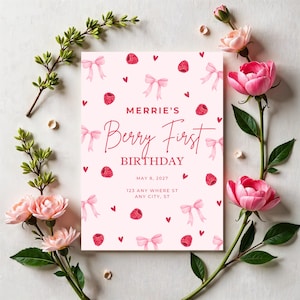 Puede incluir: Invitación de cumpleaños rosa con un diseño de frambuesas y lazos. El texto dice "Merrie's Berry First Birthday, May 8, 2027, 123 Any Where St, Any City, St."