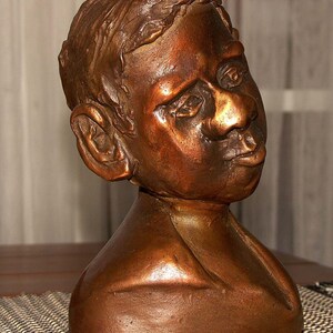 Bronze Sculpture or if you prefer bronze statue or bronze carving that is considered fine bronze  with shipping included in the sale.