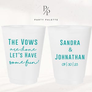 May include: Two white plastic cups with teal text. One cup says "The vows are done let's have some fun!" The other cup says "Sandra & Johnathan 09/30/23".