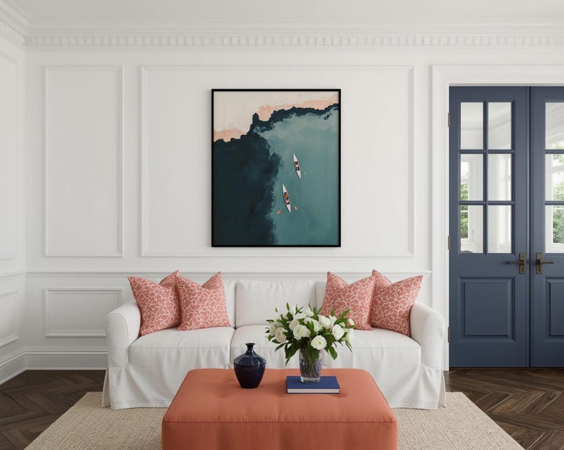 Small framed teal lake print above sofa, faded vintage finish bringing lake house decor charm