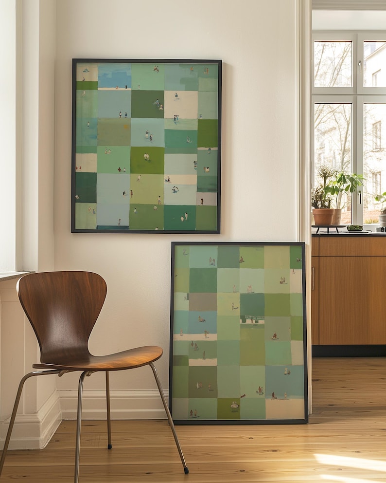 Two prints shown, one hung and one leaning by a wooden chair, green checkerboard wall art, sage green printable wall art